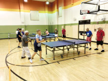 Farmers Branch and Robson Ranch Table Tennis Clubs’ members enjoy match play.