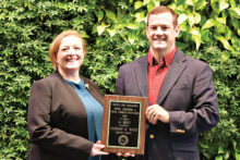 Zach A. Davis, Ag/Natural Resources Extension Agent, Denton County (right) receives a 1st place Search for Excellence award from Texas County Agricultural Agents Association President Phoenix Rogers (left) for his work with young, beginning, or small farmers and ranchers.