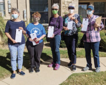 Voices United volunteers; register to vote and make your voice heard.