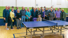 Table Tennis Club members honoring Dave Cooper.