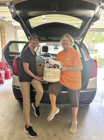 Lori Kloepper (DASF) and Janet Pauley with Sky's fundraising Gift Basket.