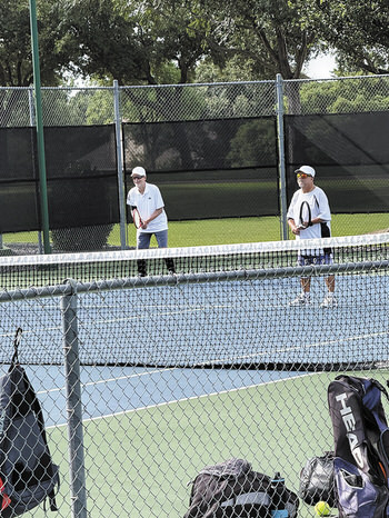 Men's Tournament runners-up Hunter Hawkins and Tom McGinnis in action.